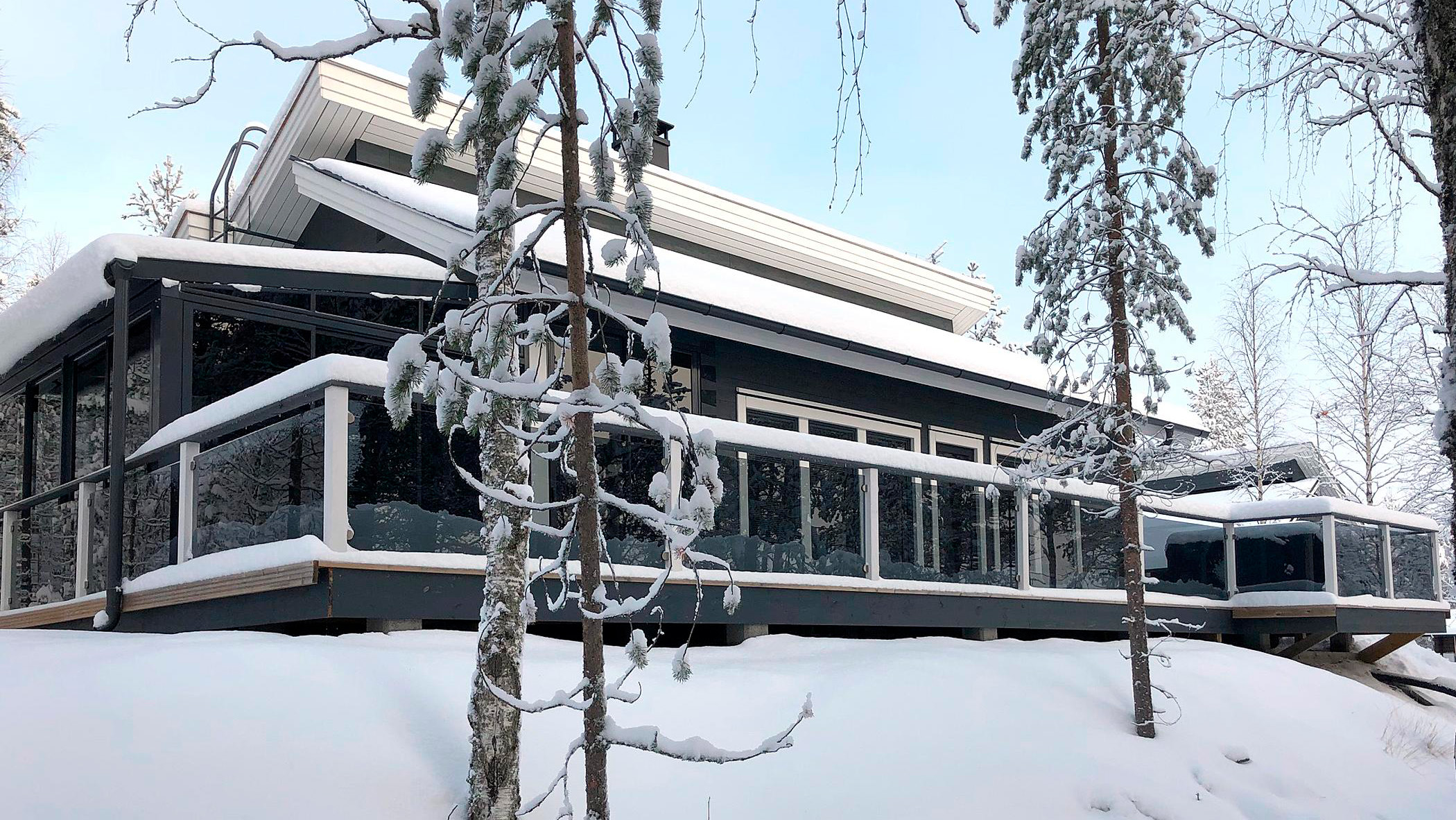 Private villacovered with snow in Finnish Lapland.