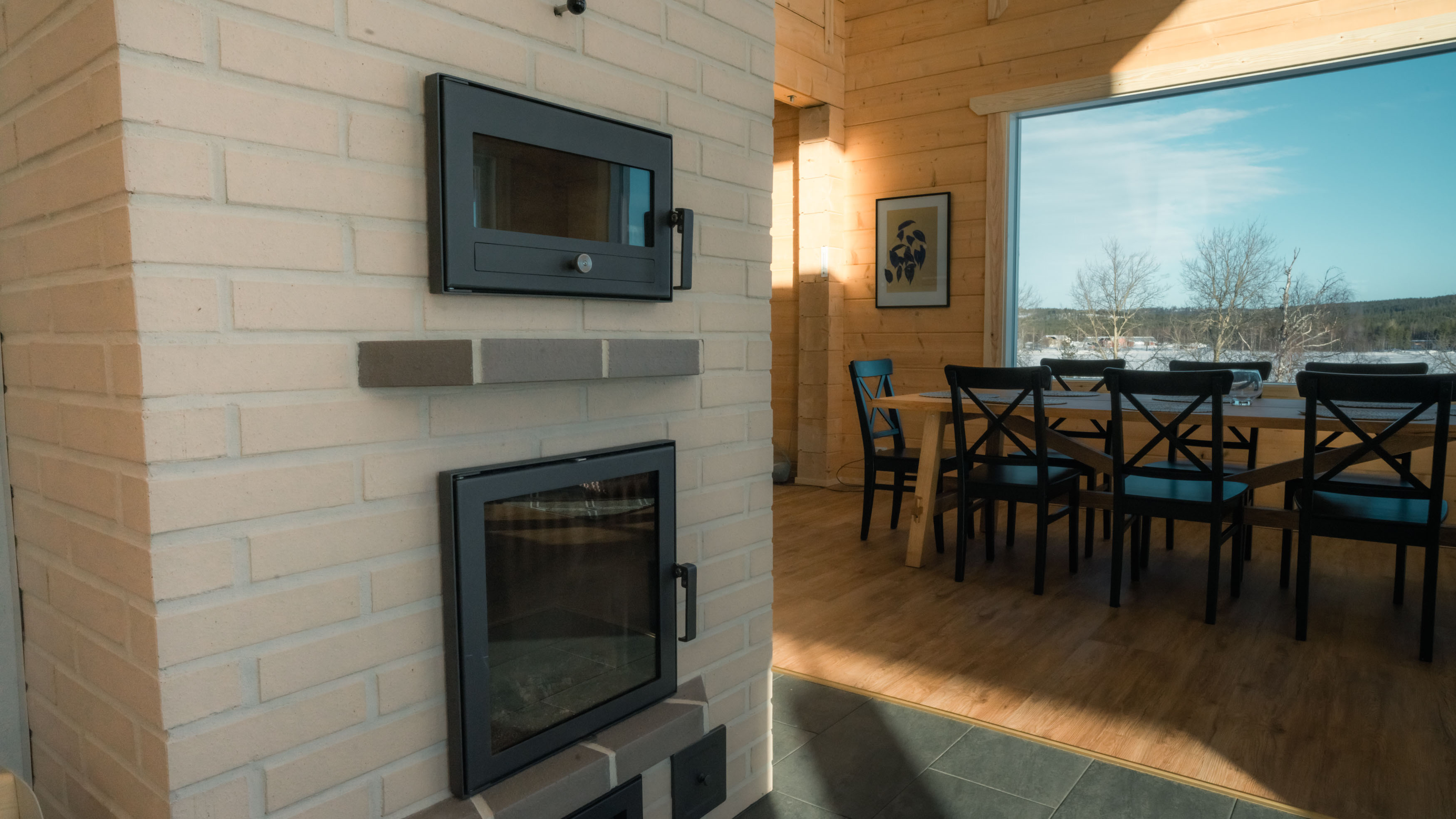 Real, traditional fire place in Lappish luxury villa.