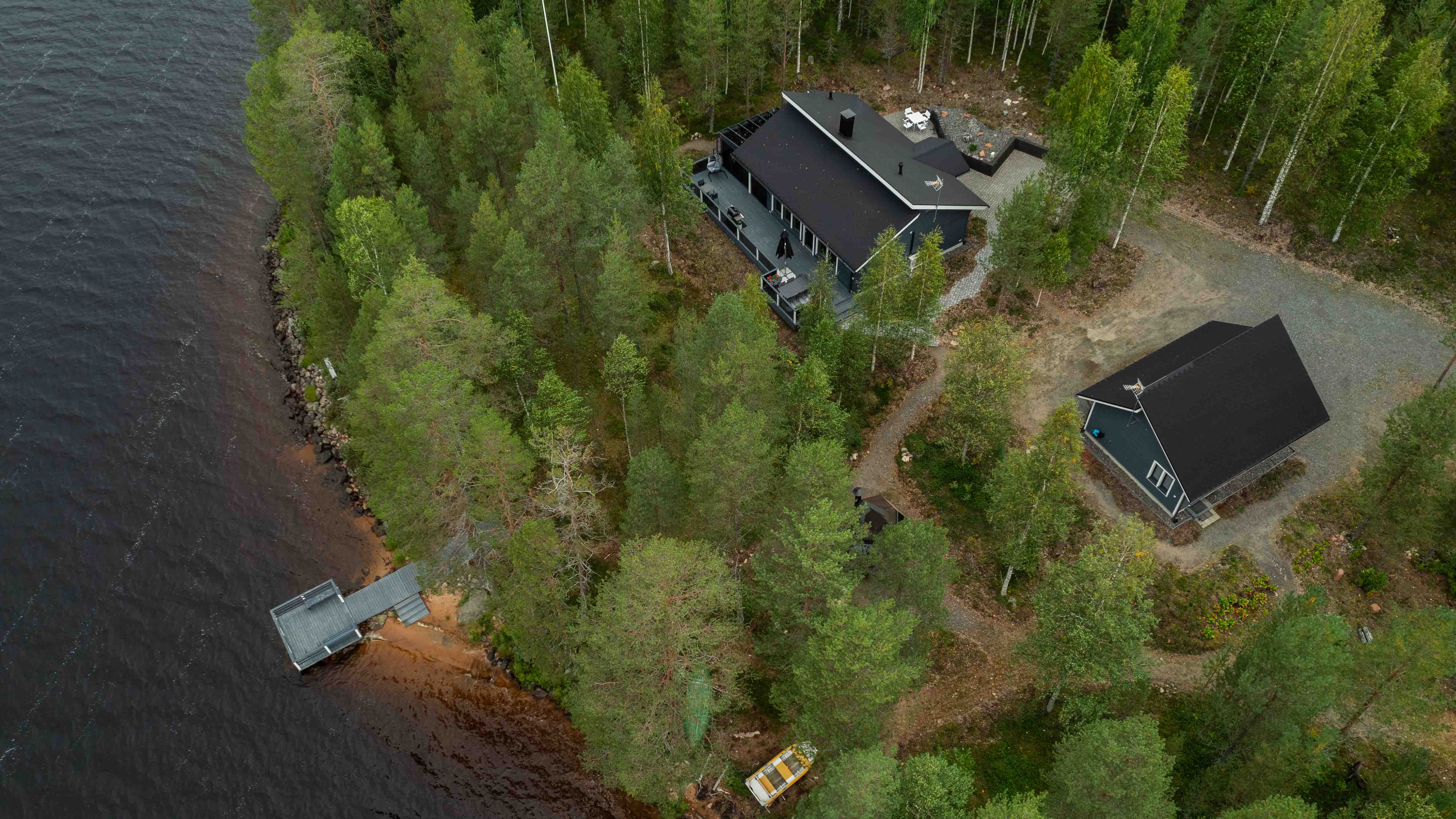 Beuatiful Villa Foresta is hidden in a serene Lappish scenery, by the lake. | Lapland Luxury