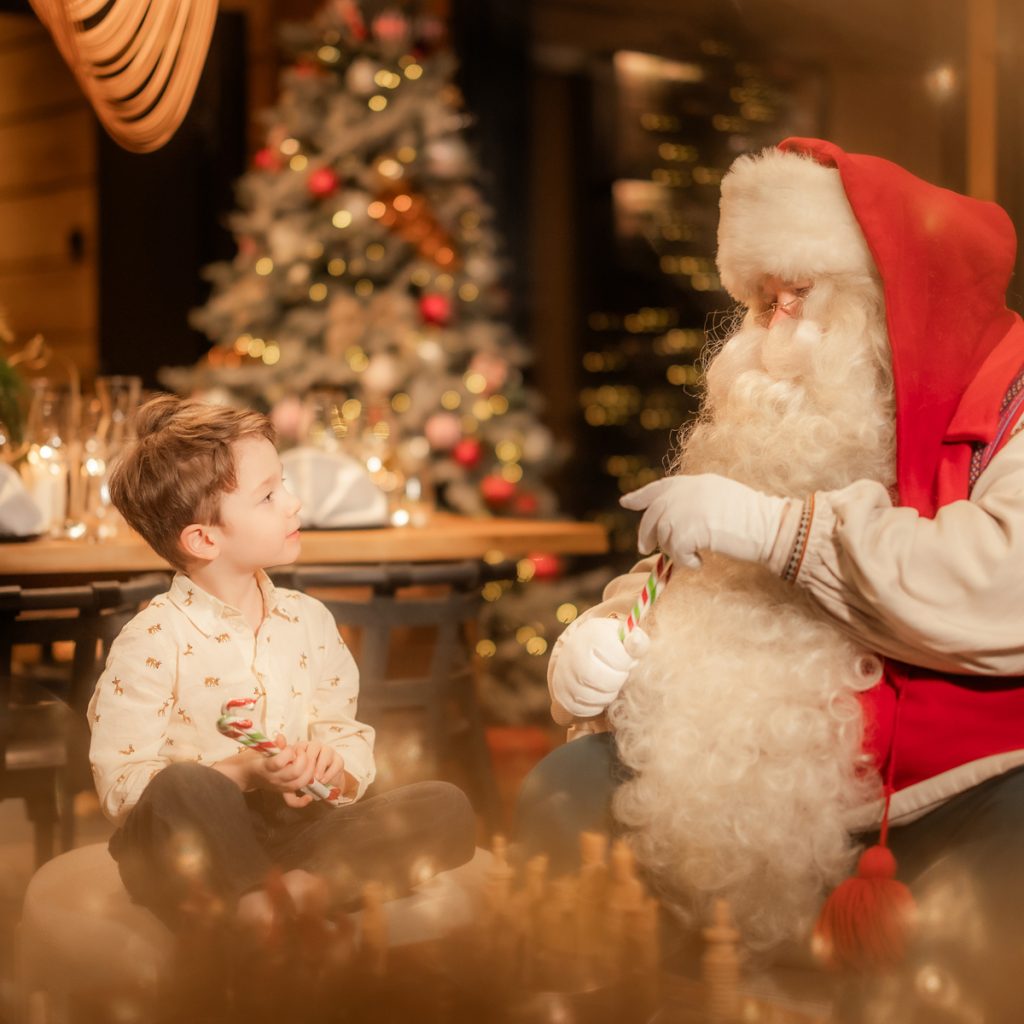 Santa Claus private visiting experience at Hidden Arctic Cloud villas. Lapland Luxury.