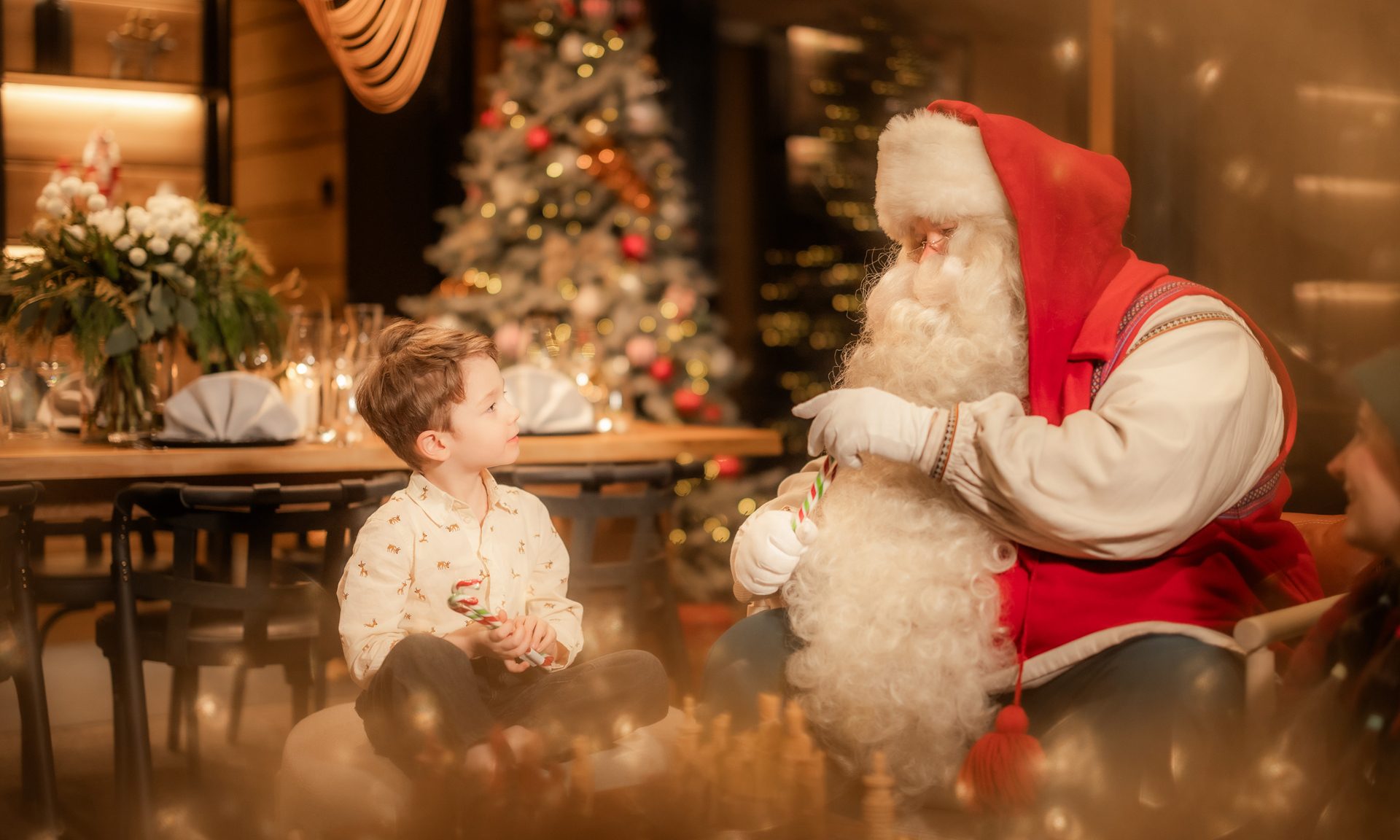 Santa Claus private visiting experience at Hidden Arctic Cloud villas. Lapland Luxury.